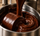 ntty dark chocolate being refined.