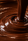 Pouring our house-made dark chocolate made from three simple ingredients: cacao, dates and cocoa butter.