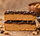 Sea Salt Chocolate peanut butter bars topped with ntty house-made dark chocolate and flaky sea salt.